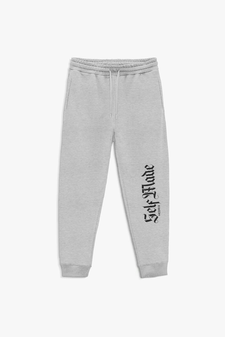 Levně Tepláky Jogger , Barva Šedá, s Potiskem Self Made Man